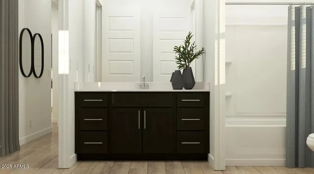 a bathroom with a sink a vanity and a mirror