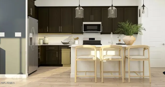 a kitchen with granite countertop a sink and a stove