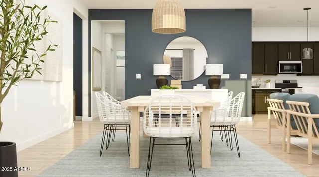 a view of a dining room with furniture