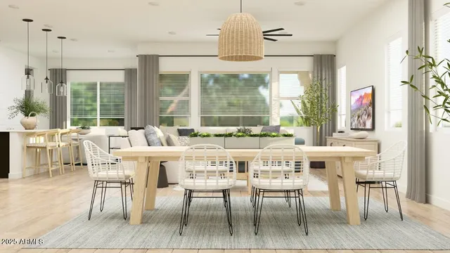 a view of a dining room with furniture window and outside view