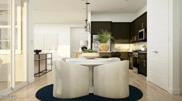 a kitchen with a sink appliances and cabinets