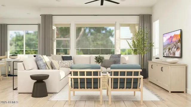 a living room with furniture and a large window