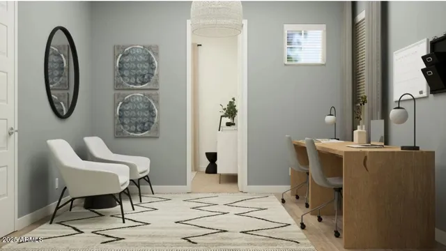 a living room with furniture a table and chair