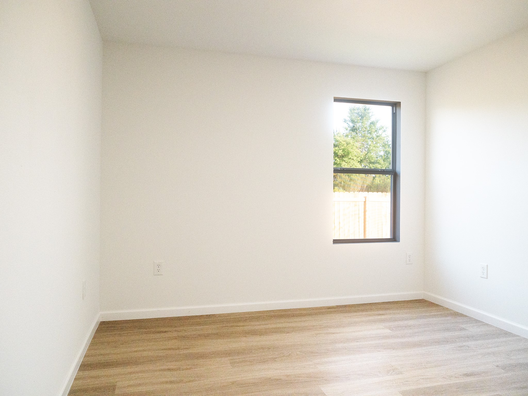 37 Road 5102, Unit L Cleveland, TX 77327 - Photo 13 of 29 an empty room with a window