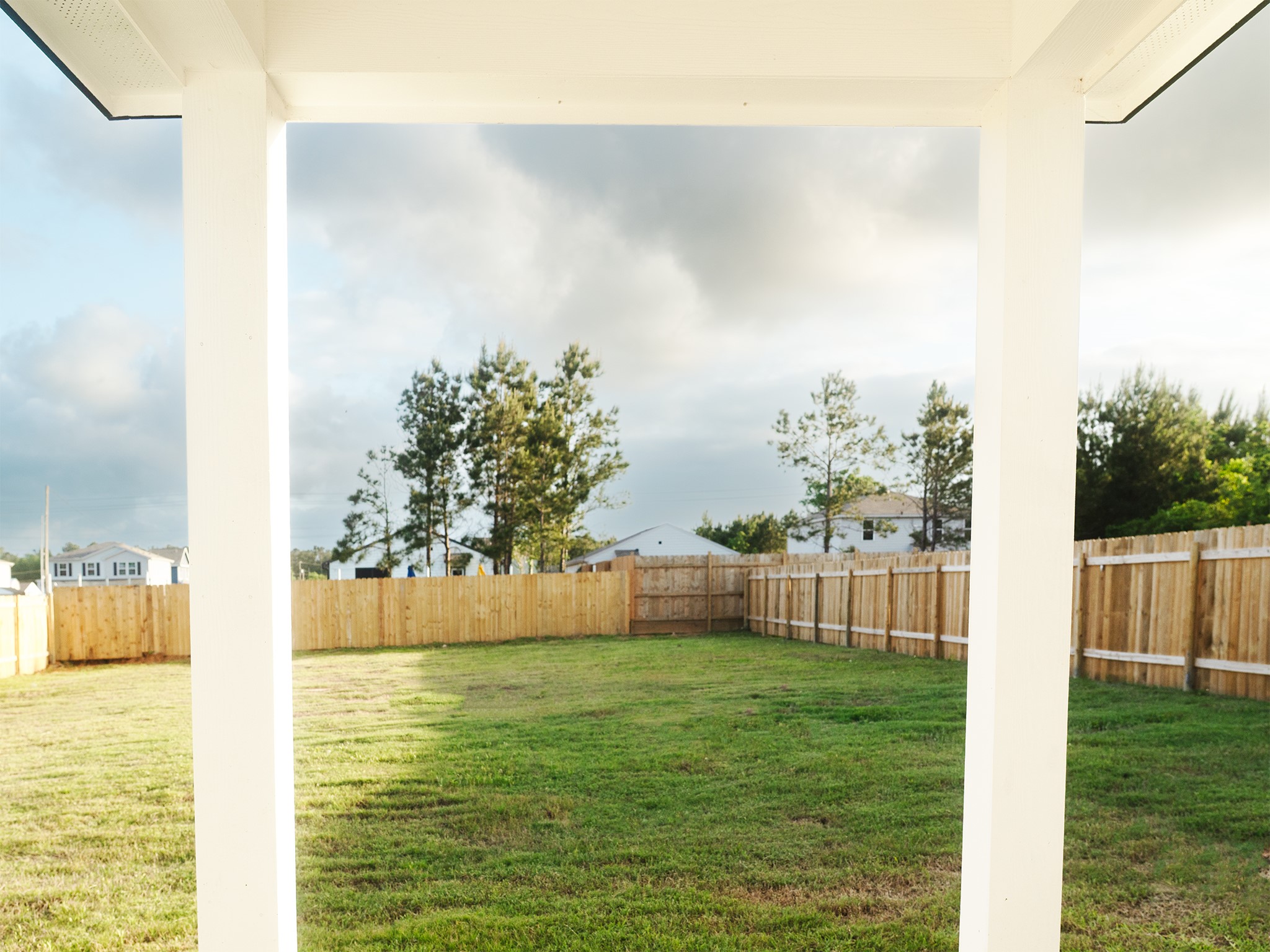 37 Road 5102, Unit L Cleveland, TX 77327 - Photo 20 of 29 a view of outdoor space with garden