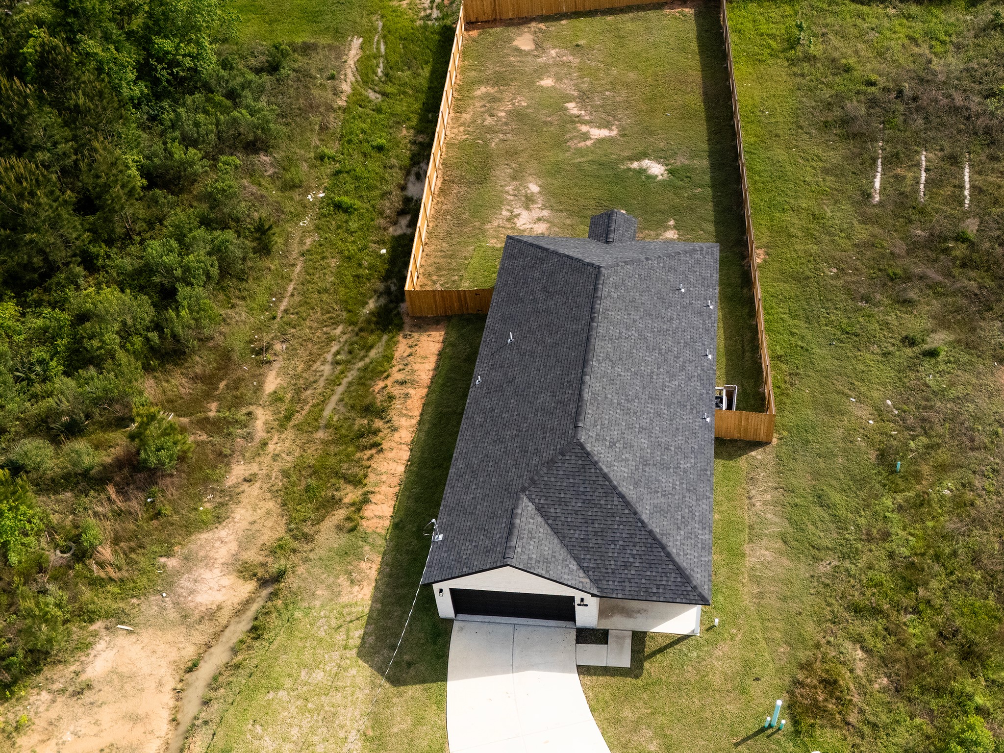 37 Road 5102, Unit L Cleveland, TX 77327 - Photo 25 of 29 a aerial view of a house with swimming pool