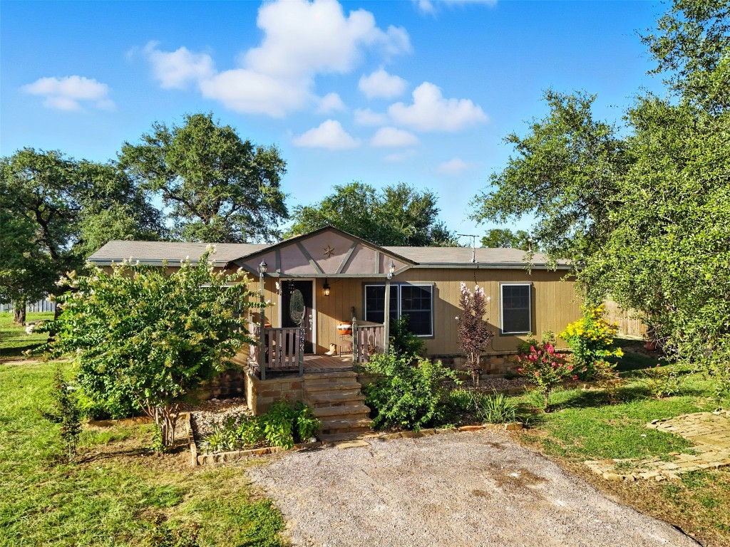 View of front of property featuring roof with shingles