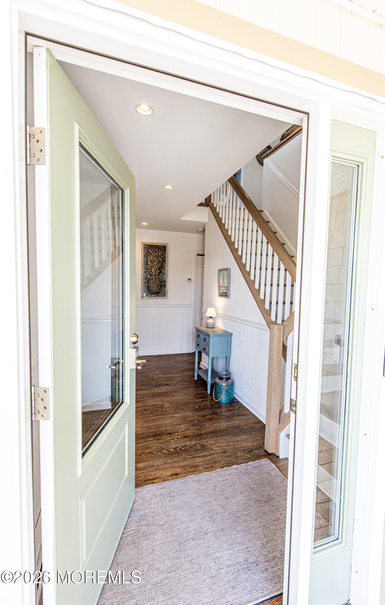 5 A Sunset Boulevard Barnegat Light, NJ 08006 - Photo 6 of 65 a view of entryway and hall with wooden floor