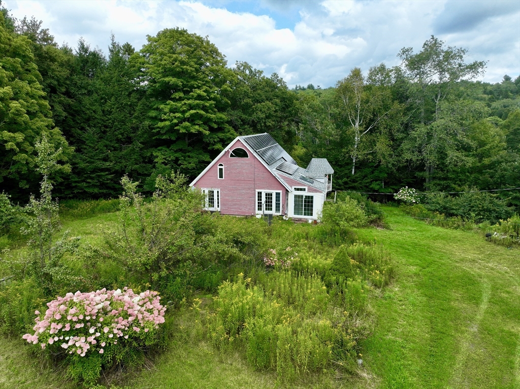 302 Number 9 Road Heath, MA 01367 - Photo 3 of 31 a front view of a house with garden