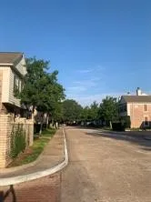 a view of a lake with a house in the background