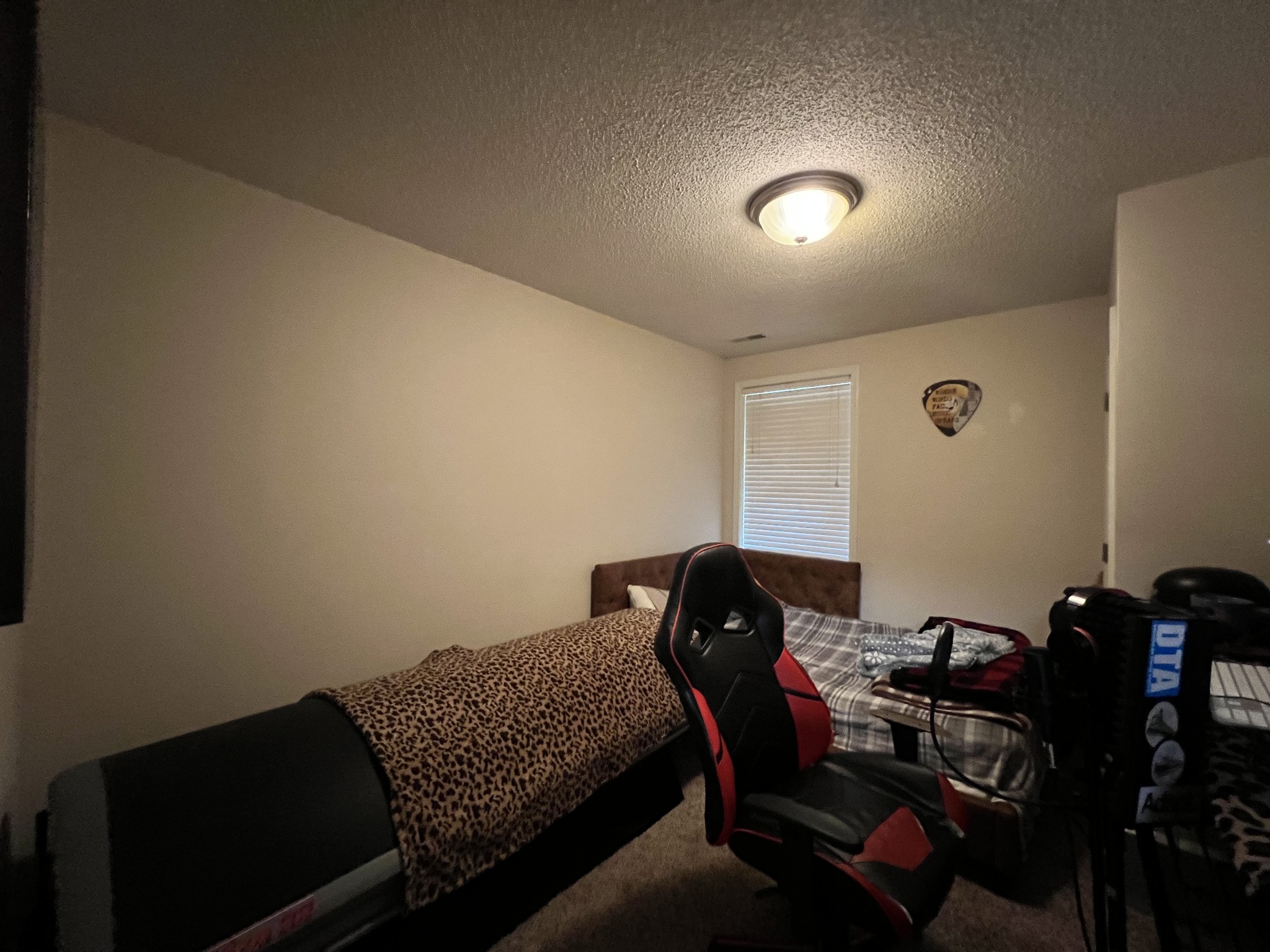 3366 Brownsville Road Clarksville, TN 37043 - Photo 18 of 23 a room with furniture wall paintings and a window