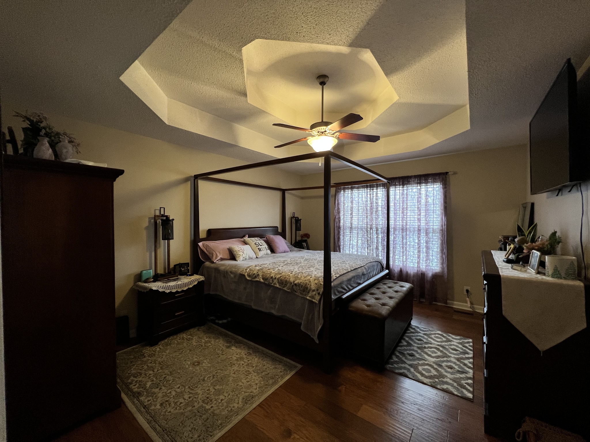3366 Brownsville Road Clarksville, TN 37043 - Photo 8 of 23 a bedroom with a bed and wooden floor