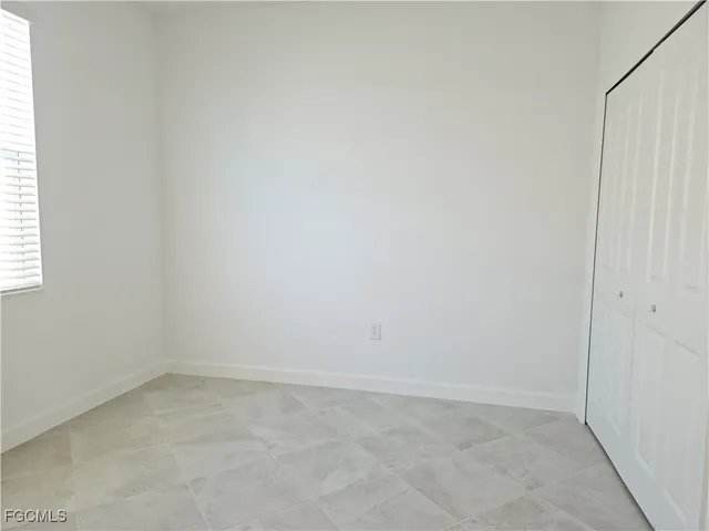 an empty room with a window