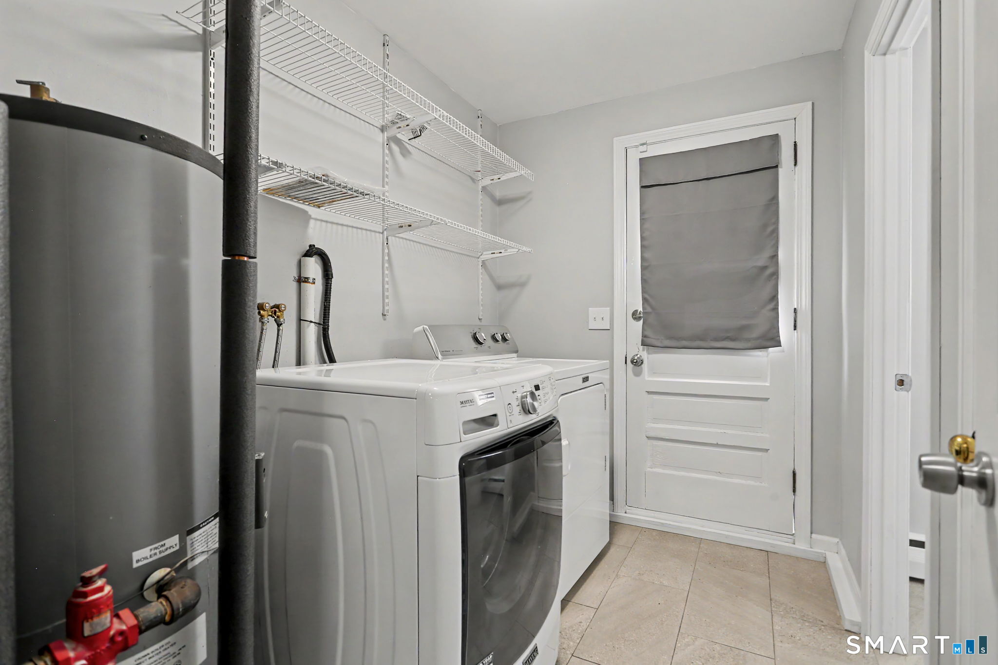 143 Ranch Drive Bridgeport, CT 06606 - Photo 21 of 32 Laundry room in Lower Level with backyard access