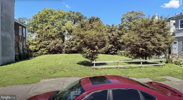 a view of a yard with an outdoor space