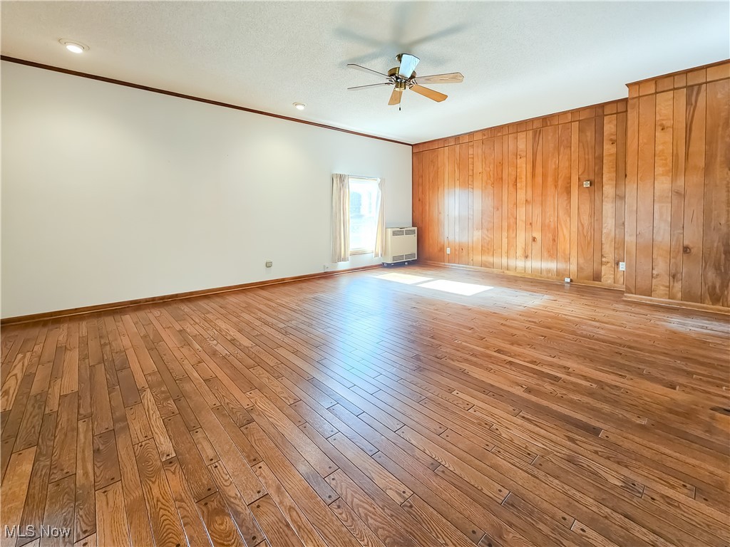 6040 Firestone Road Northeast Canton, OH 44721 - Photo 17 of 26 Family Room - Hardwood Flooring