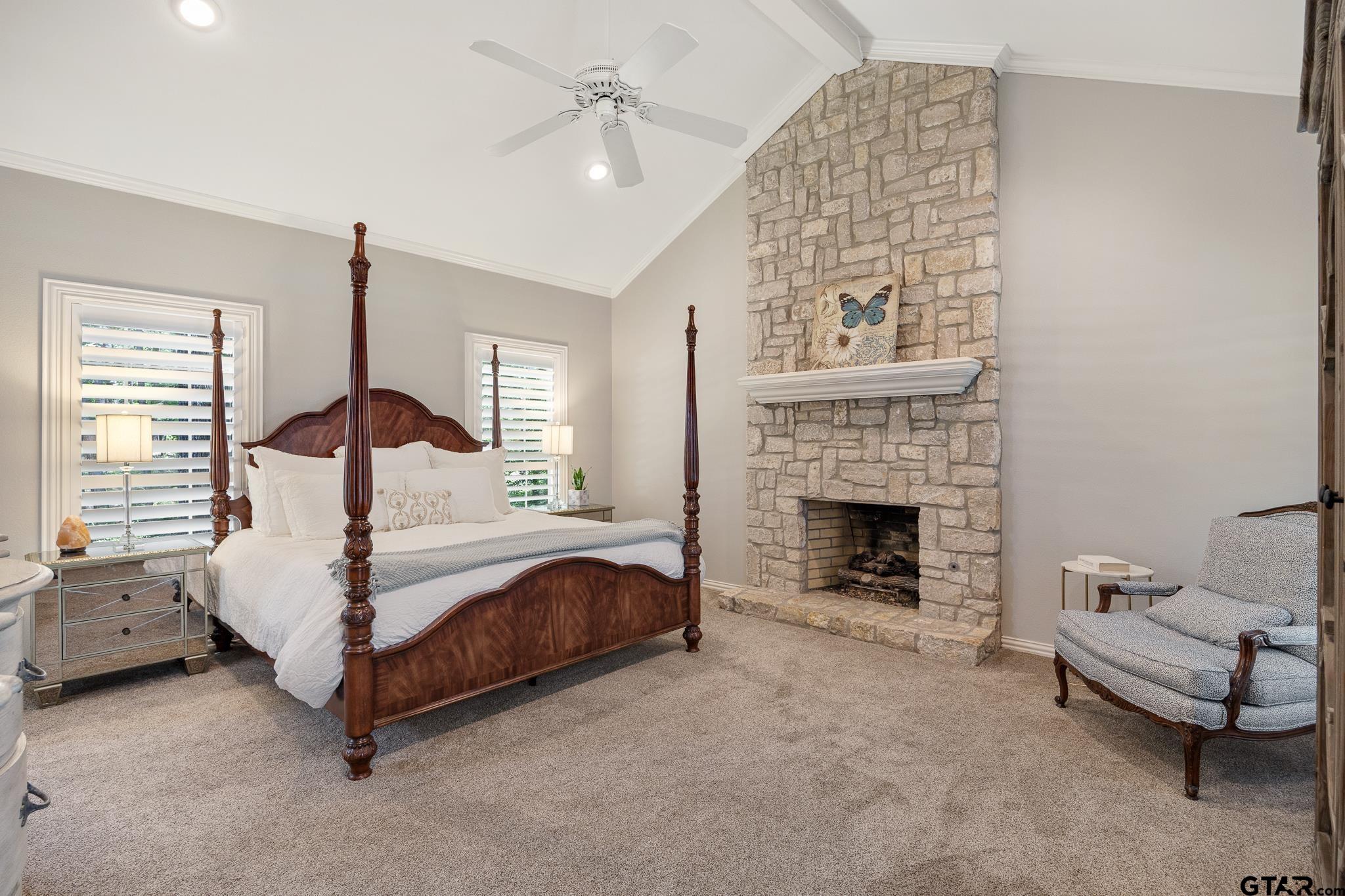 18076 Deer Trail Flint, TX 75762 - Photo 14 of 46 a bed room with a bed and a fireplace