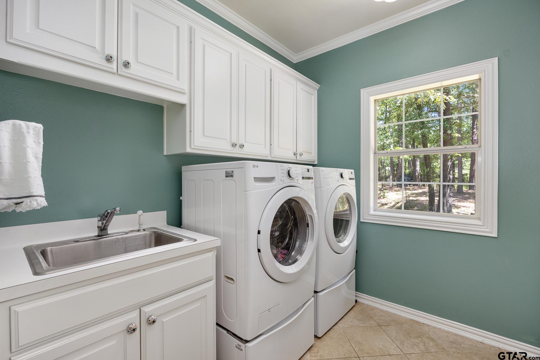 18076 Deer Trail Flint, TX 75762 - Photo 26 of 46 a utility room with dryer and washer