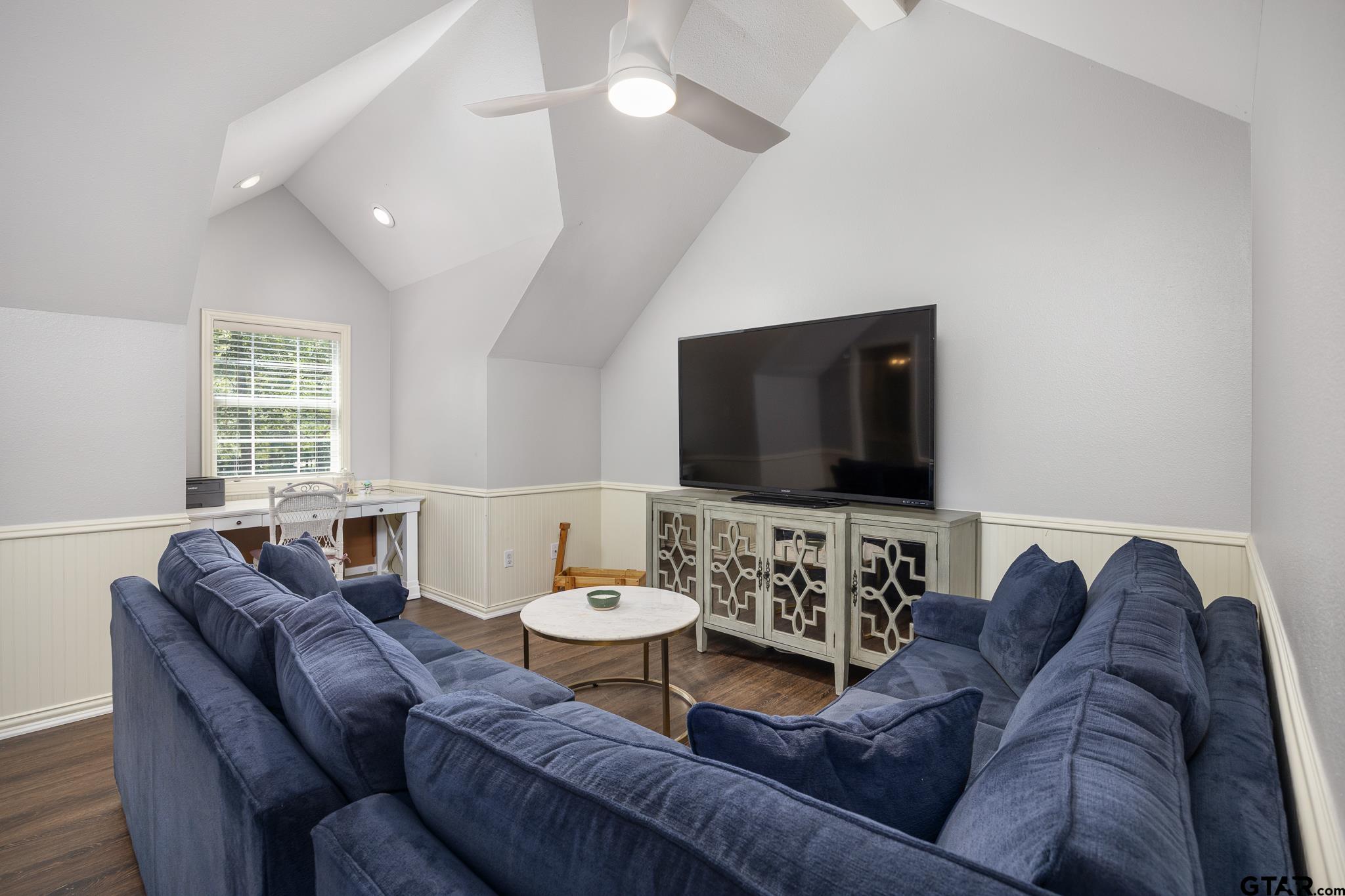 18076 Deer Trail Flint, TX 75762 - Photo 32 of 46 a living room with furniture and a flat screen tv
