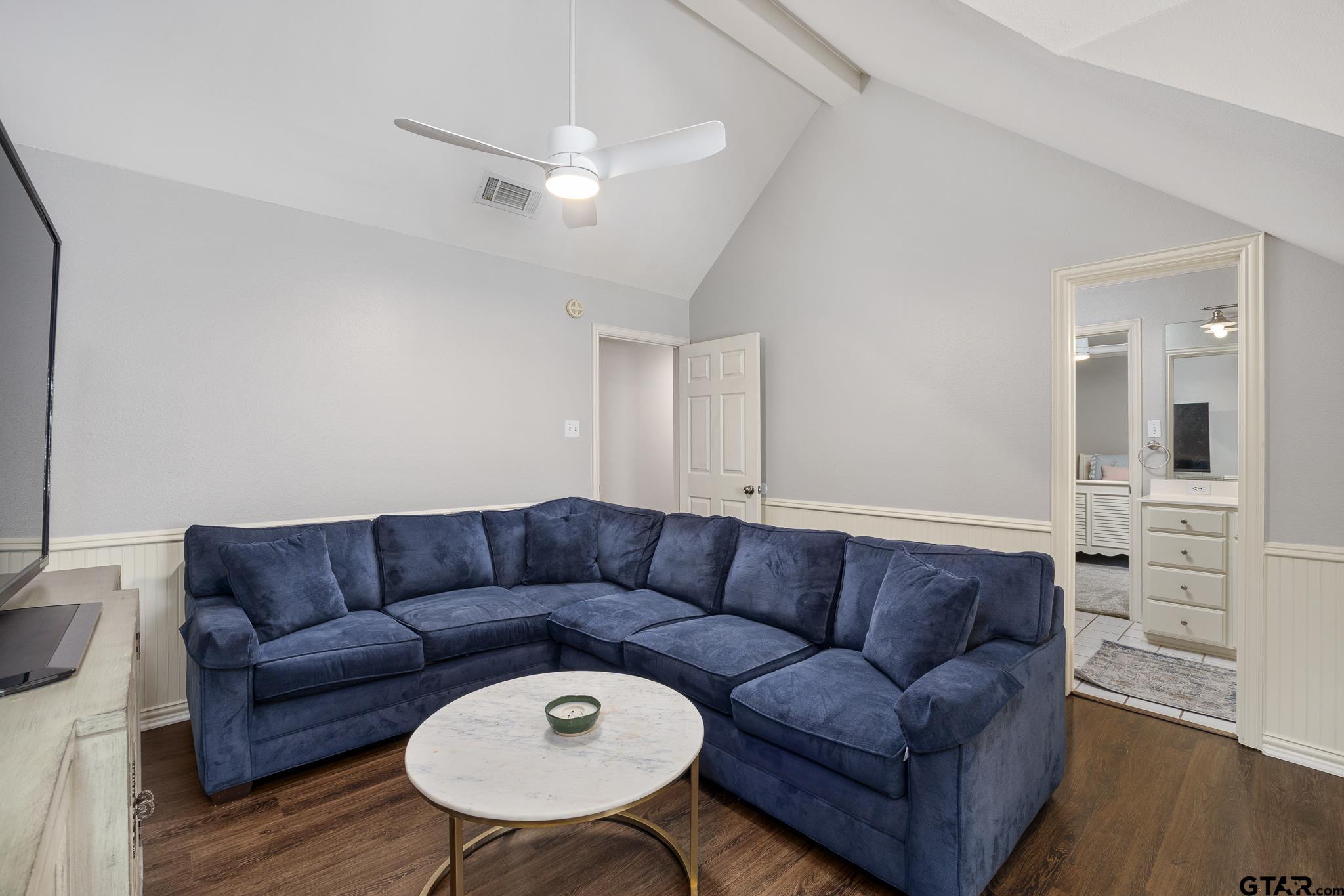 18076 Deer Trail Flint, TX 75762 - Photo 33 of 46 a living room with furniture a couch and wooden floor