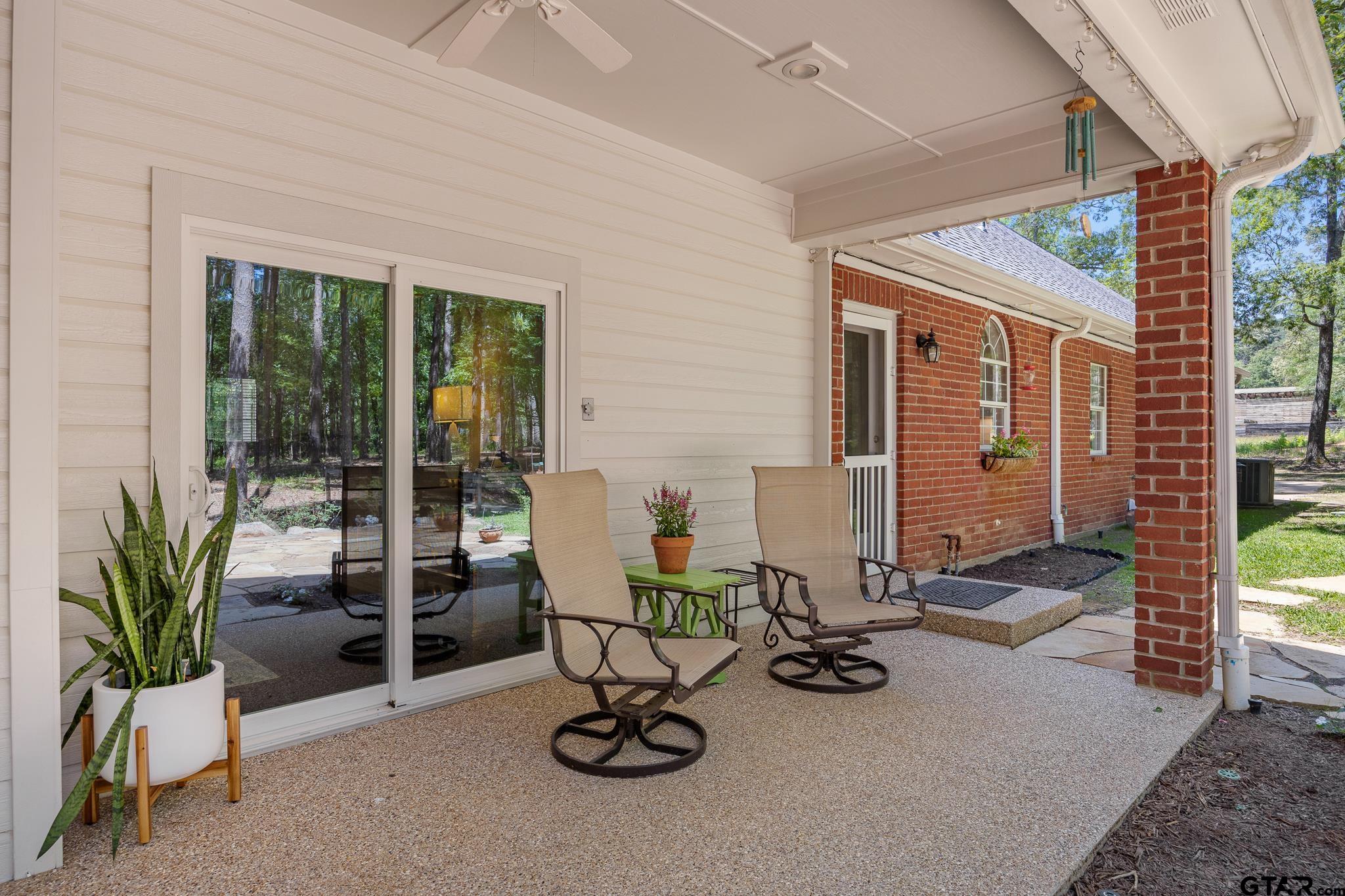 18076 Deer Trail Flint, TX 75762 - Photo 40 of 46 a view of a livingroom with furniture and floor to ceiling window