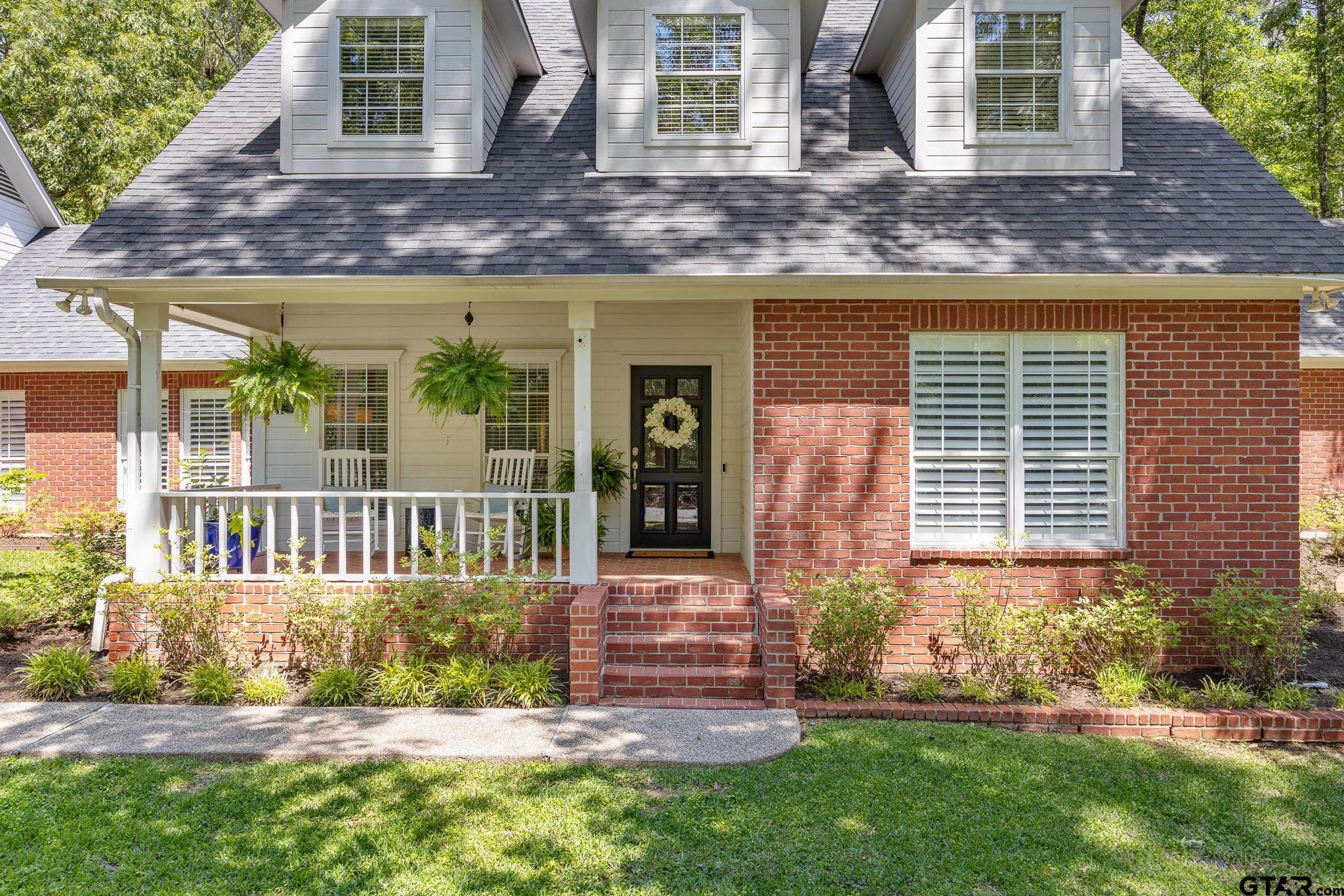 18076 Deer Trail Flint, TX 75762 - Photo 5 of 46 a front view of a house with a yard