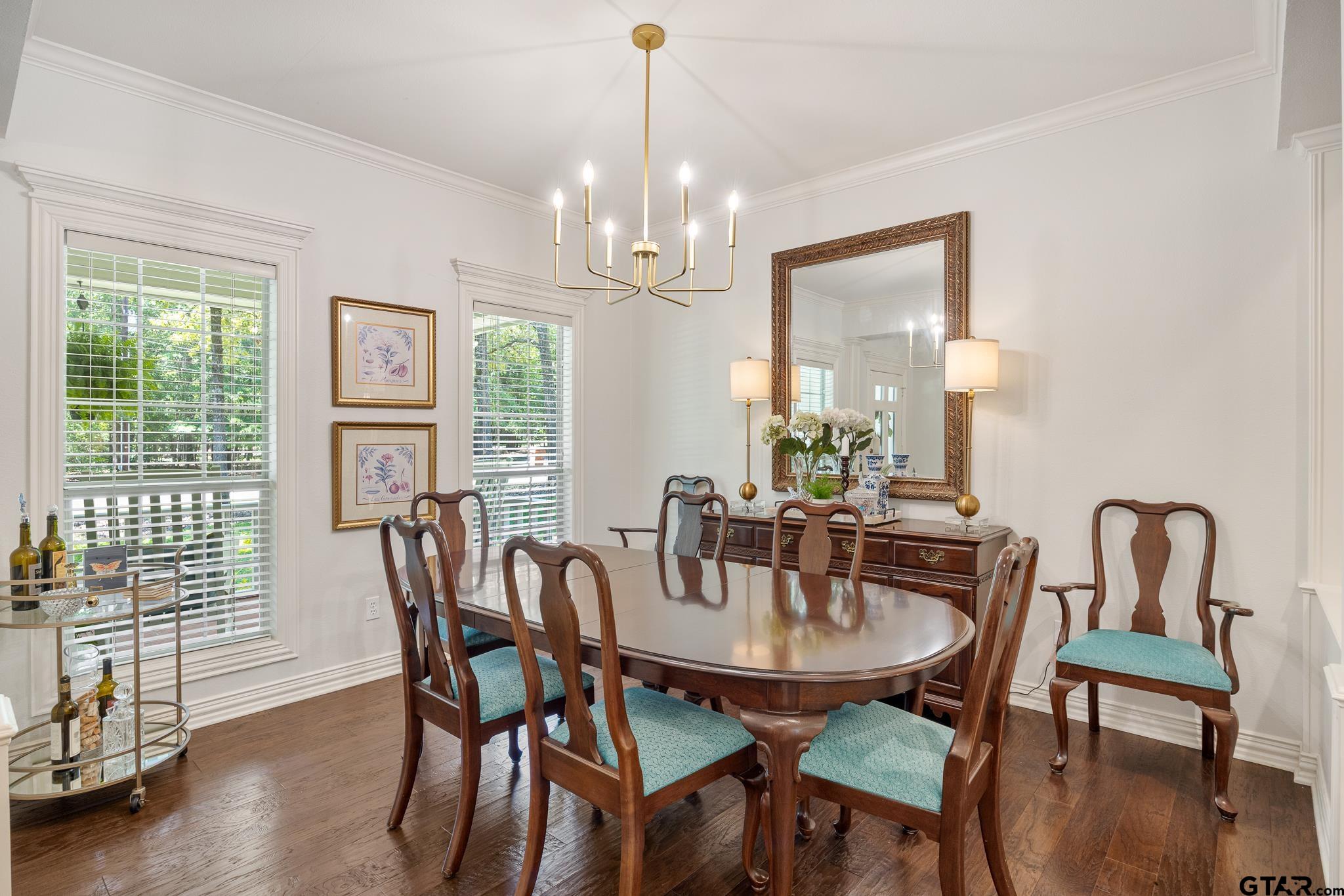 18076 Deer Trail Flint, TX 75762 - Photo 8 of 46 a view of a dining room with furniture window and wooden floor