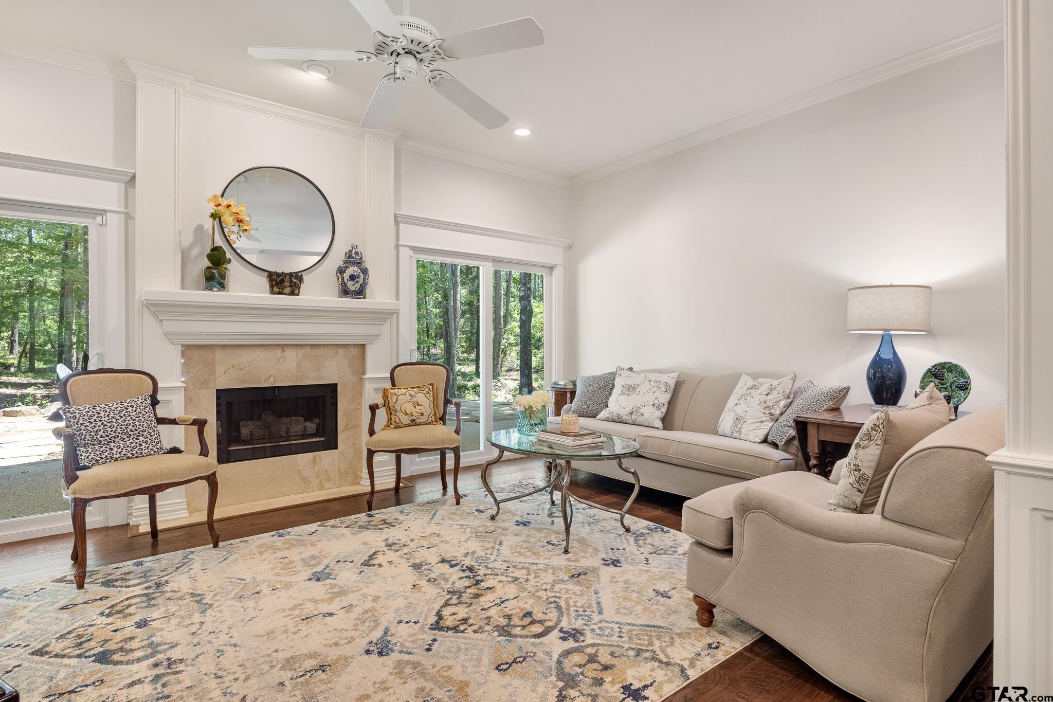18076 Deer Trail Flint, TX 75762 - Photo 10 of 46 a living room with furniture and a fireplace