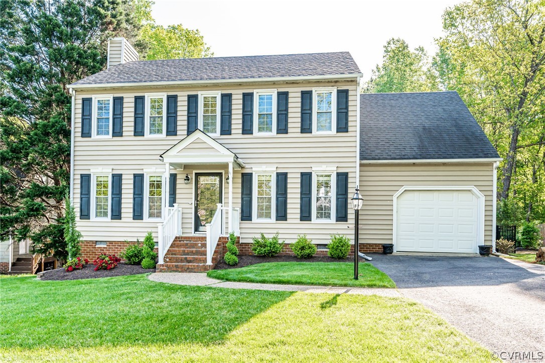 5427 Standing Oak Road Midlothian, VA 23112 - Photo 1 of 33 front view of a house next to a yard