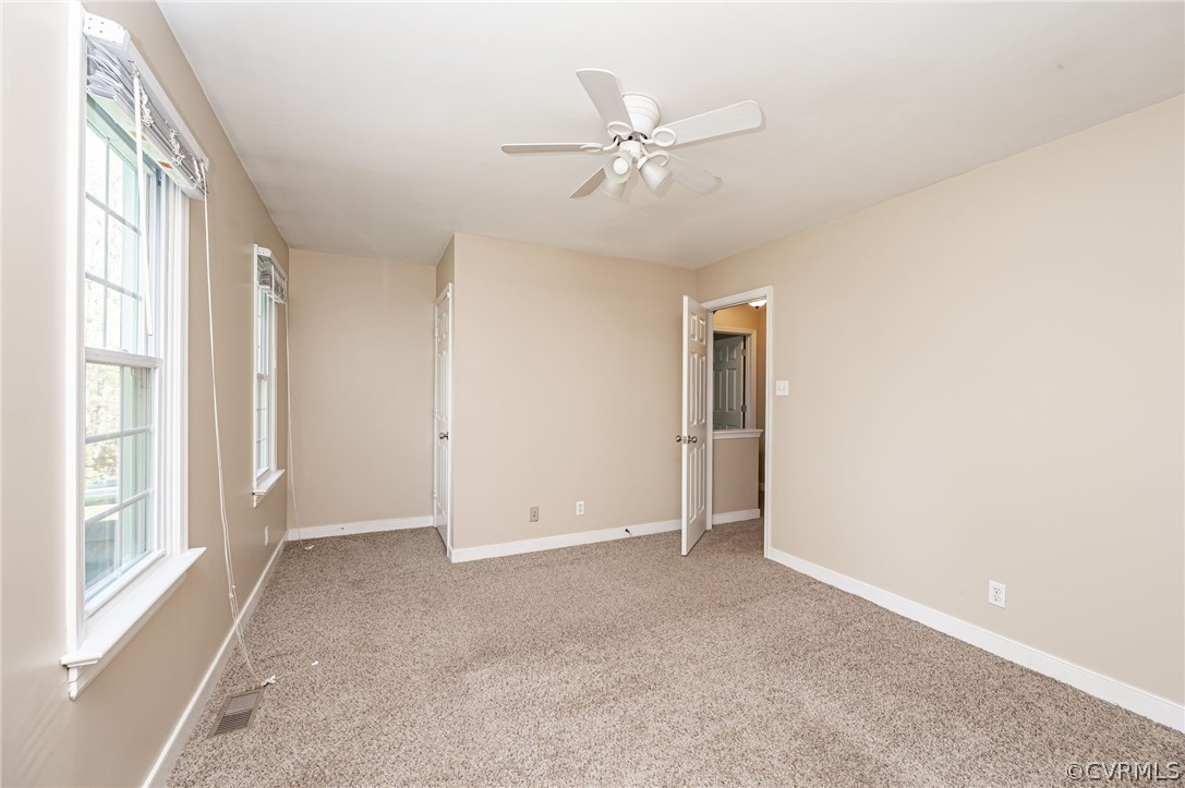 5427 Standing Oak Road Midlothian, VA 23112 - Photo 25 of 33 a view of an empty room with a window