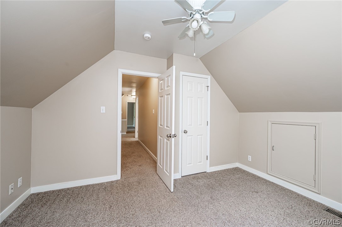 5427 Standing Oak Road Midlothian, VA 23112 - Photo 28 of 33 an empty room with a fan and a fan