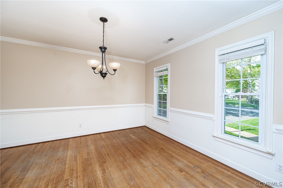 5427 Standing Oak Road Midlothian, VA 23112 - Photo 8 of 33 a view of empty room with wooden floor and fan