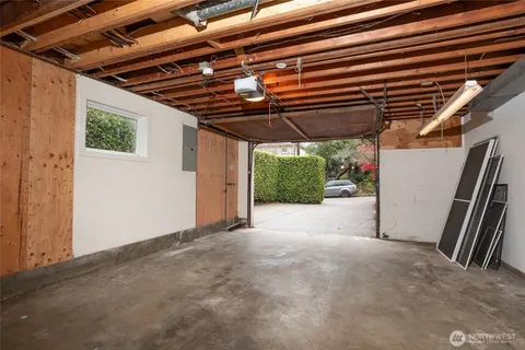 a view of a couches on deck and city view