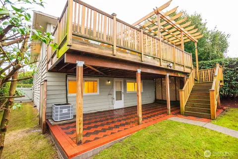 a aerial view of a house with a garden and plants