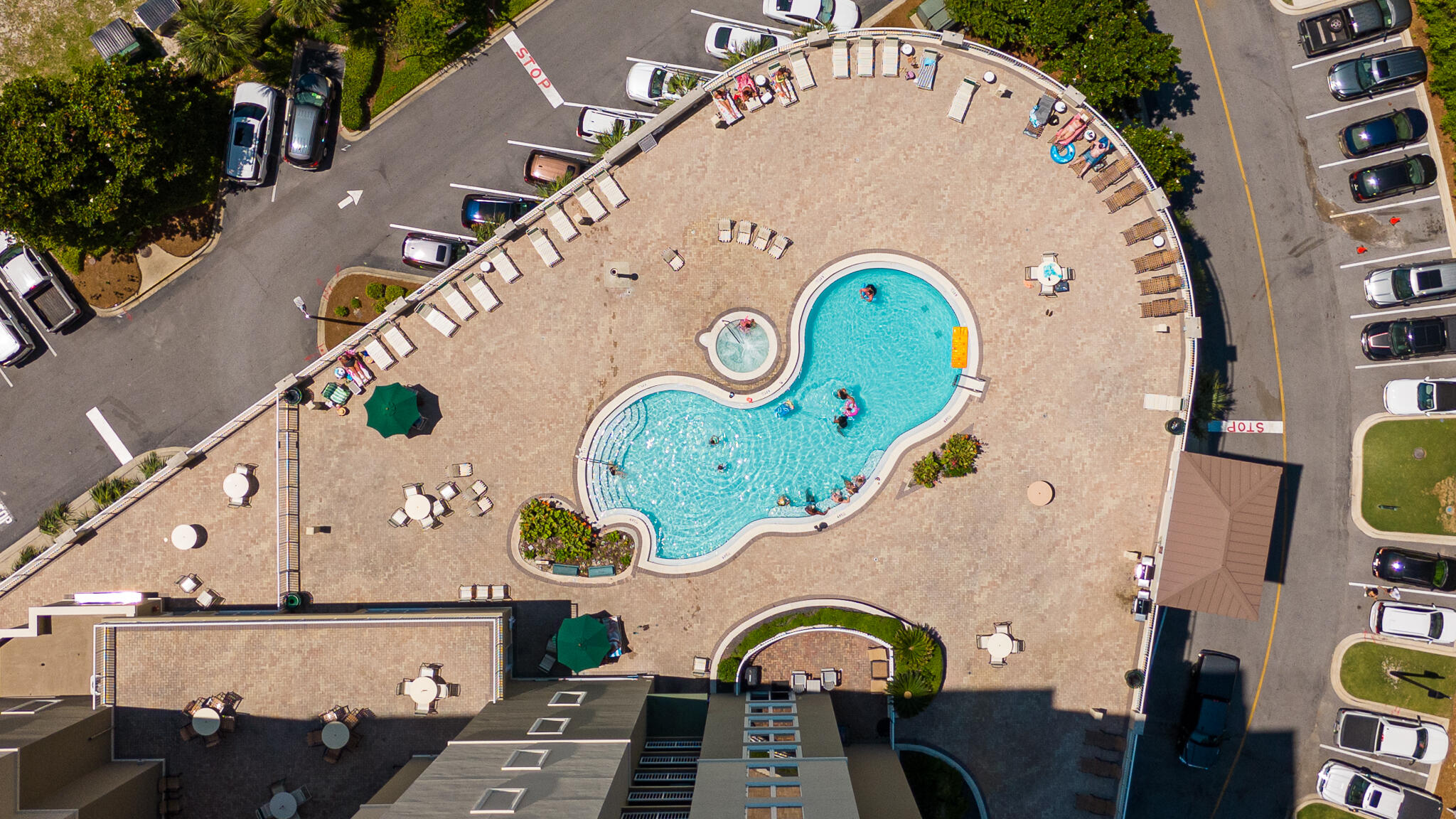 11800 Front Beach Road, Unit 2408 Panama City Beach, FL 32407 - Photo 31 of 42 an aerial view of a swimming pool outdoor seating
