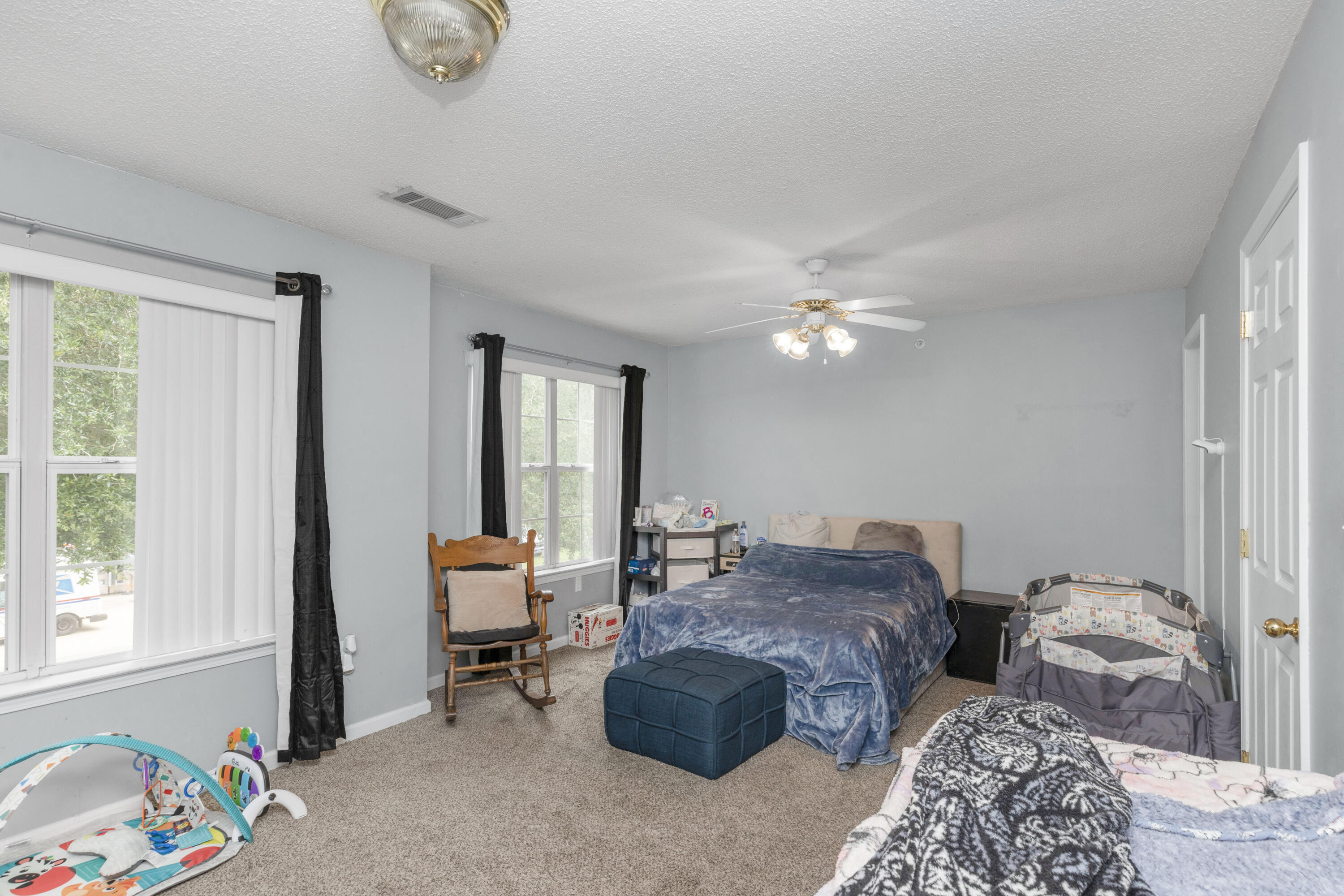 341 Crooked Pine Trail Crestview, FL 32539 - Photo 12 of 27 a living room with furniture and a window