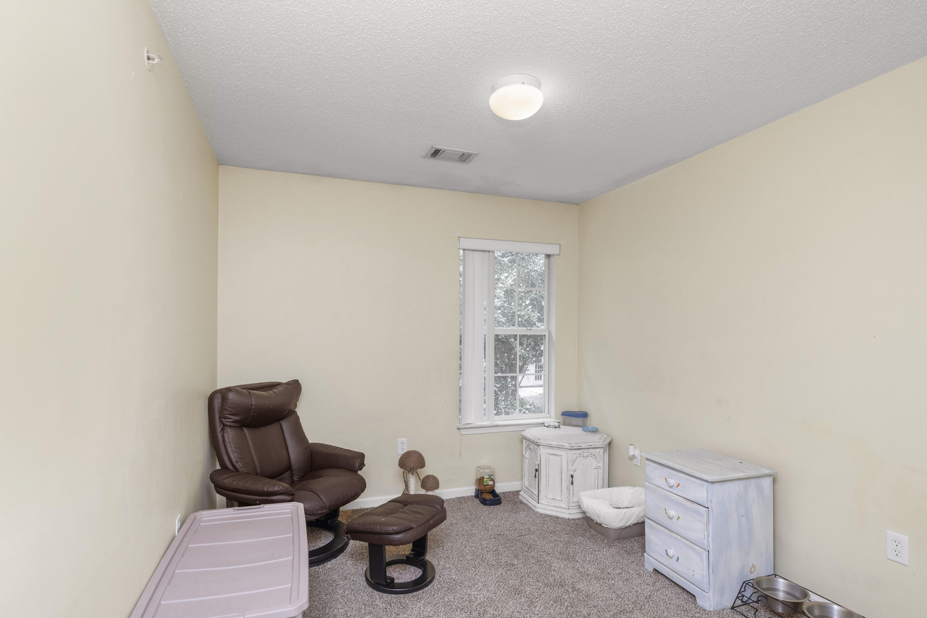 341 Crooked Pine Trail Crestview, FL 32539 - Photo 17 of 27 a living room with furniture and a window