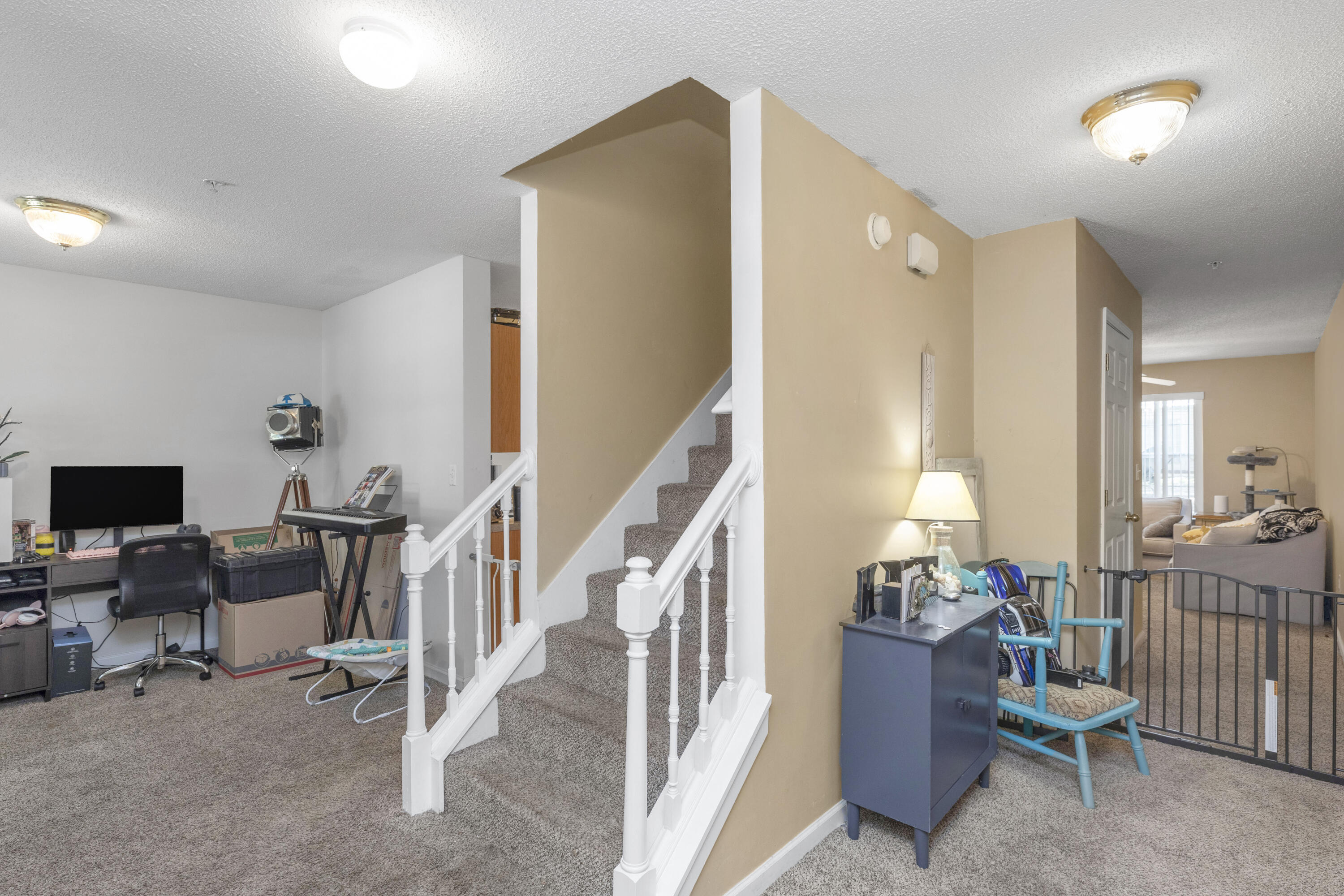 341 Crooked Pine Trail Crestview, FL 32539 - Photo 2 of 27 a view of a livingroom with furniture and staircase