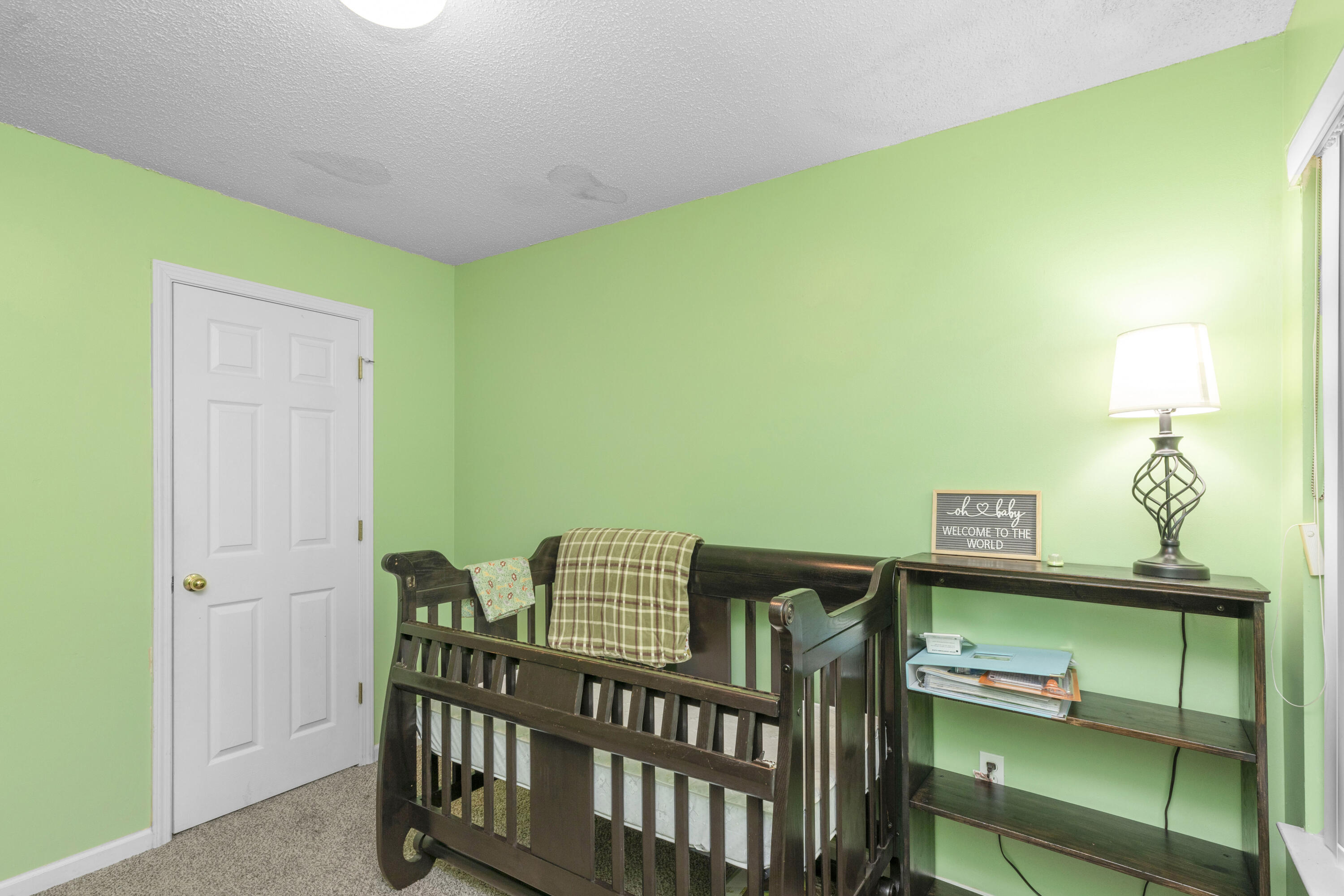 341 Crooked Pine Trail Crestview, FL 32539 - Photo 22 of 27 a view of a room with shelves