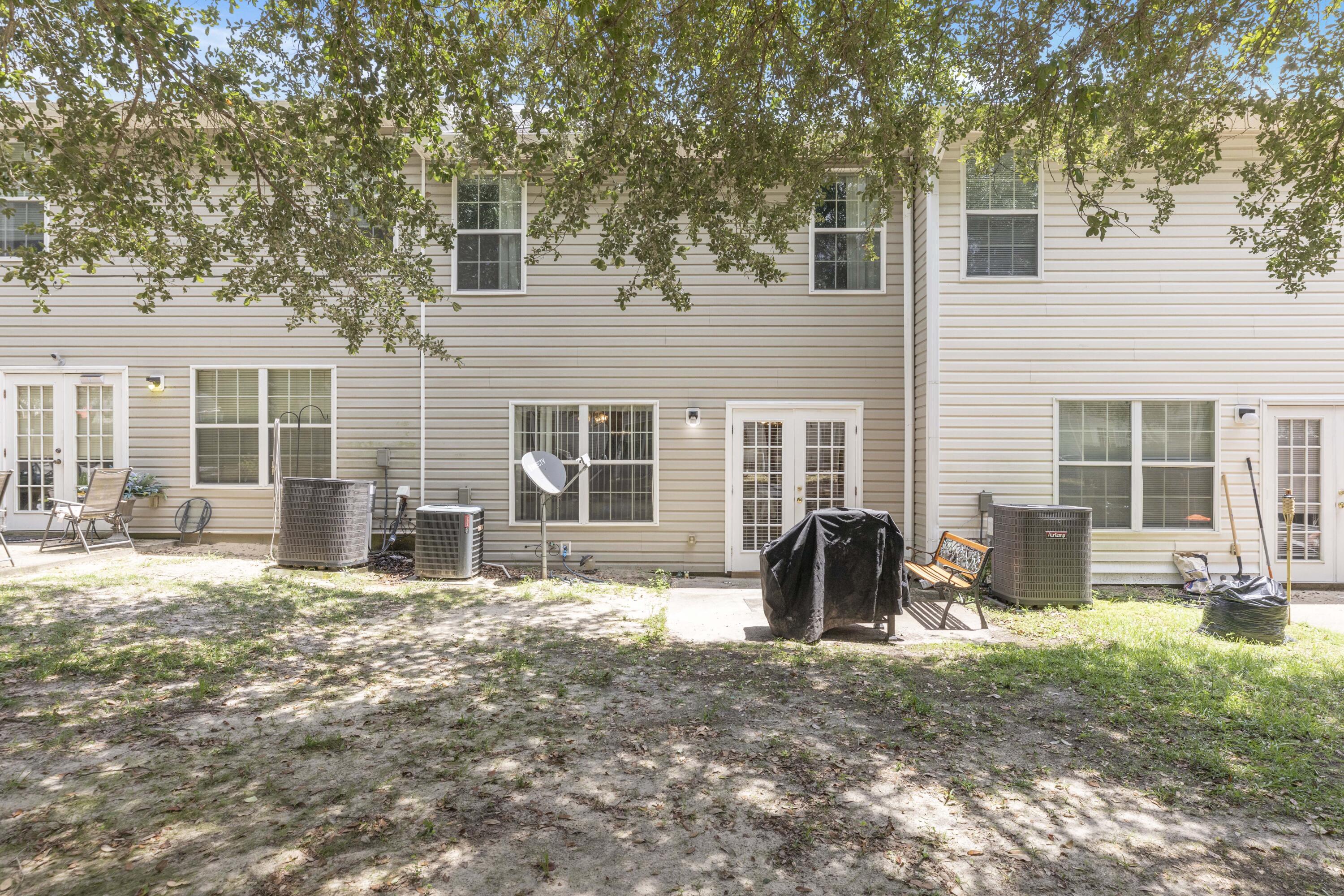 341 Crooked Pine Trail Crestview, FL 32539 - Photo 26 of 27 a front view of a house with patio