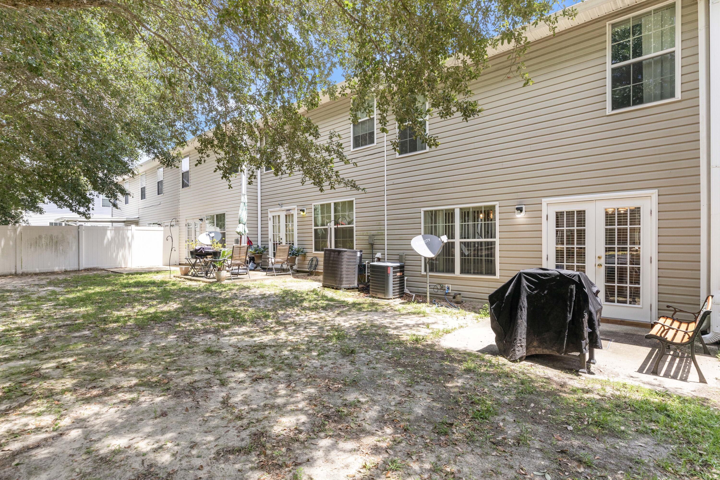 341 Crooked Pine Trail Crestview, FL 32539 - Photo 27 of 27 a view of a house with backyard and sitting area