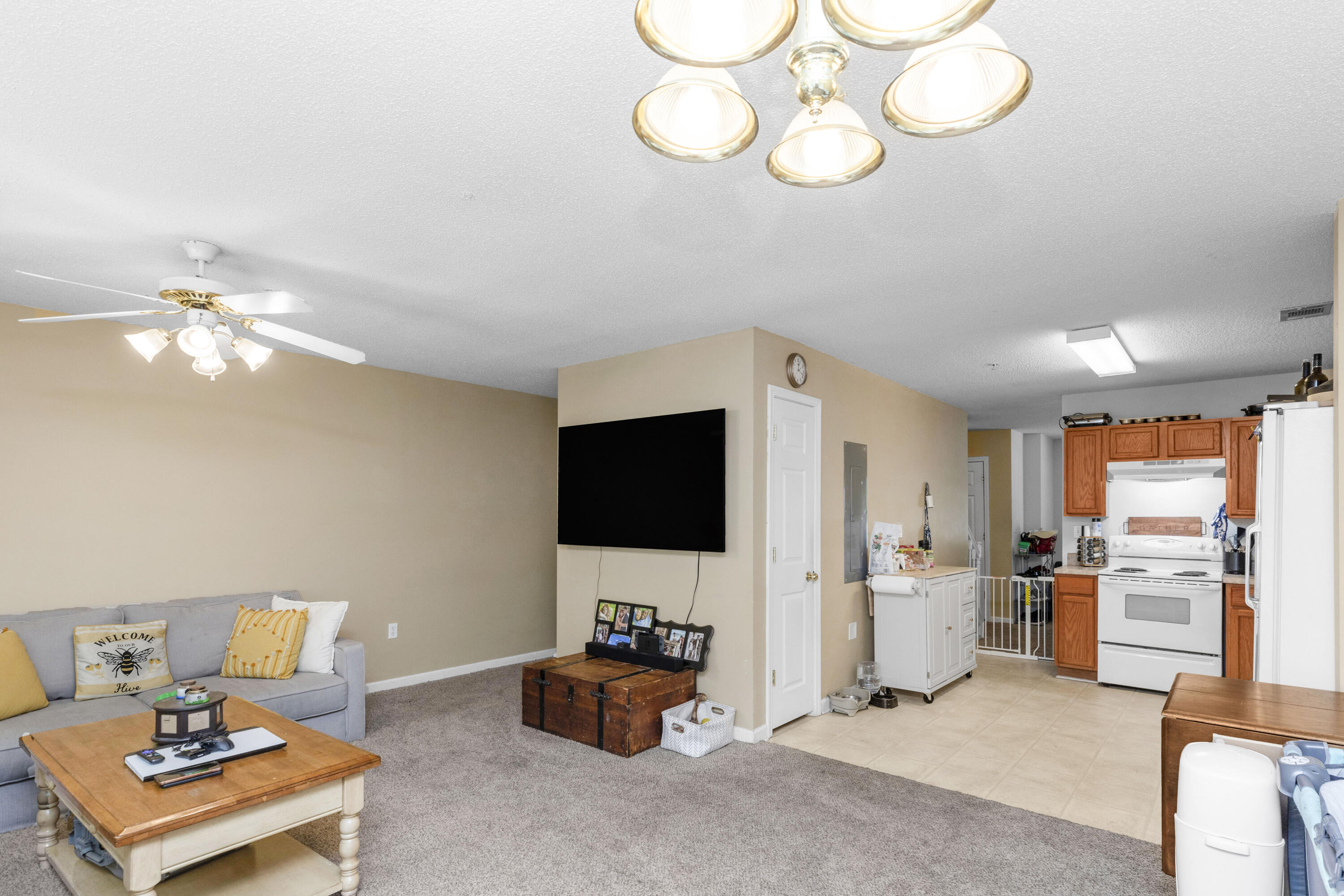 341 Crooked Pine Trail Crestview, FL 32539 - Photo 7 of 27 a living room with furniture and a flat screen tv