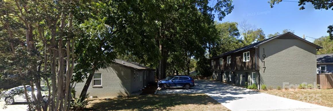 1909 Pegram Street Charlotte, NC 28205 - Photo 1 of 48 a view of a back yard of the house
