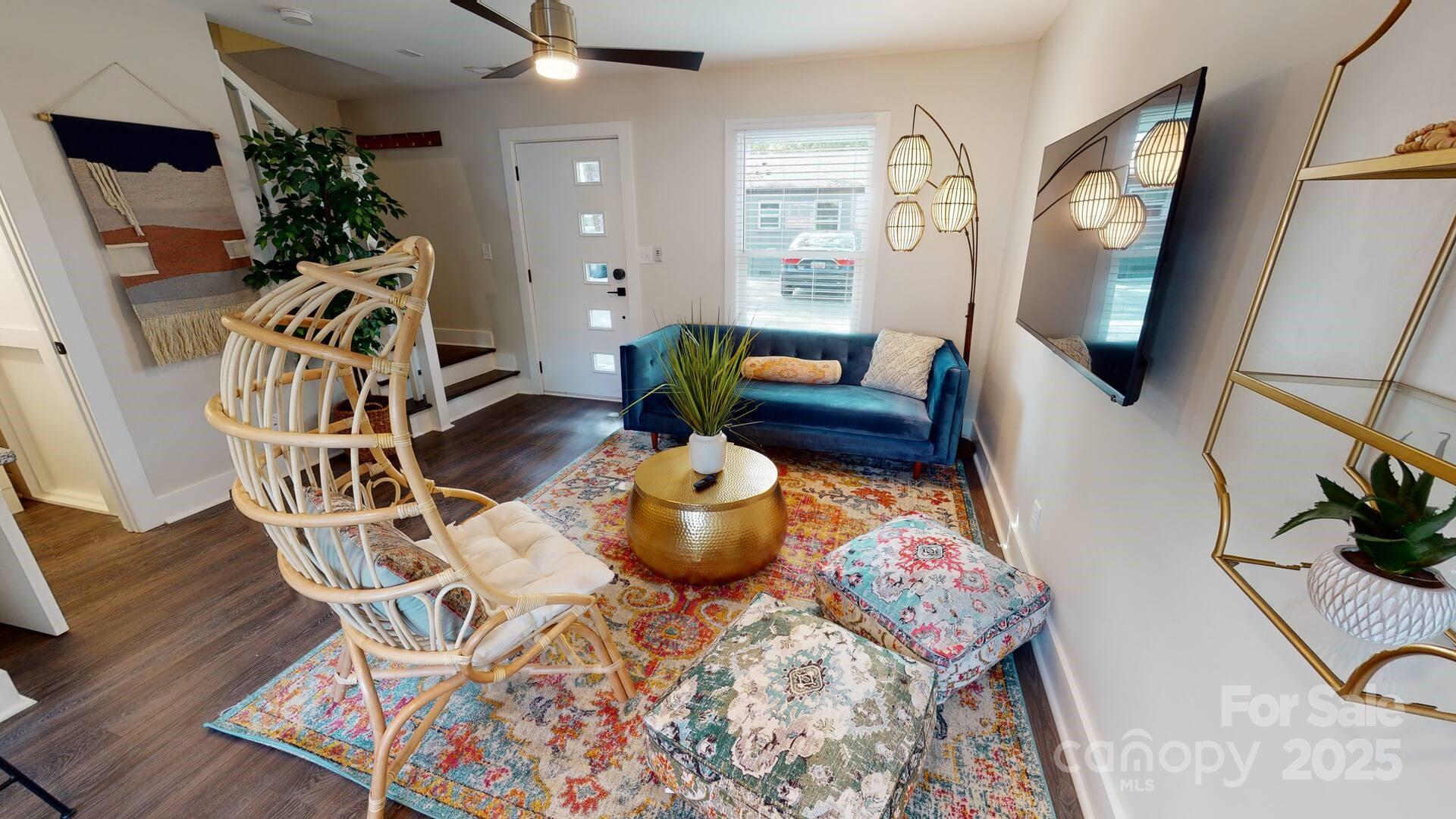 1909 Pegram Street Charlotte, NC 28205 - Photo 27 of 48 a living room with furniture and a mirror