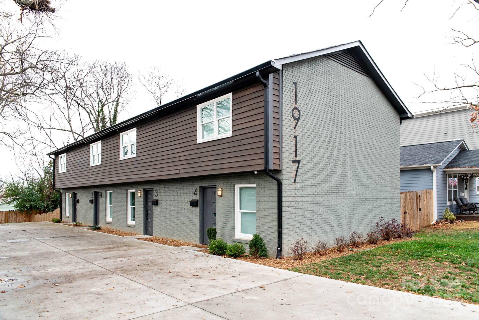 1909 Pegram Street Charlotte, NC 28205 - Photo 32 of 48 a front view of a house with a garden