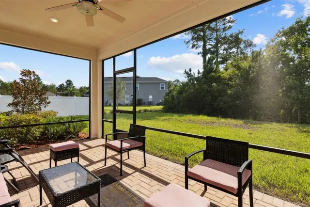 a view of a house with a yard and plants