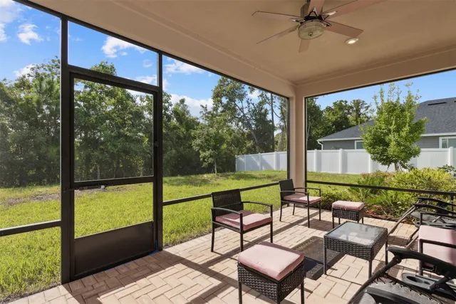 an aerial view of a house with a lake view