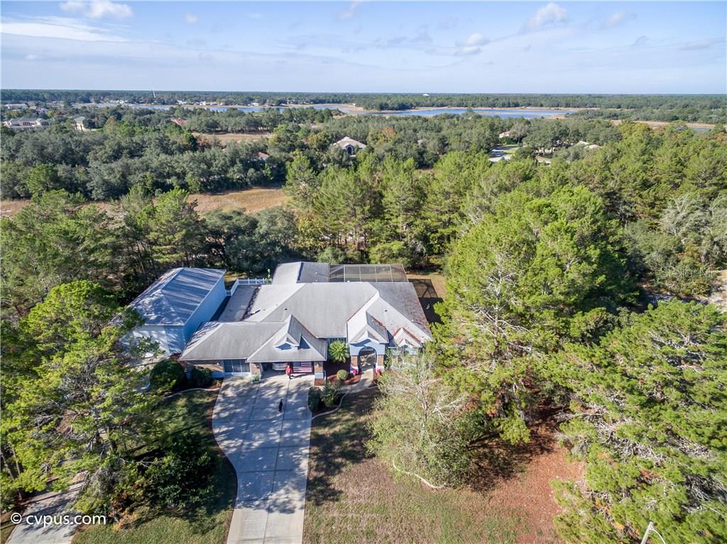 9613 Whisper Ridge Trail Weeki Wachee, FL 34613 - Photo 1 of 1 Car - Boat - RV we gave room for all - over 3 acres - 3/2.5/3 POOL home with detached garage accommodates up to 9 cars