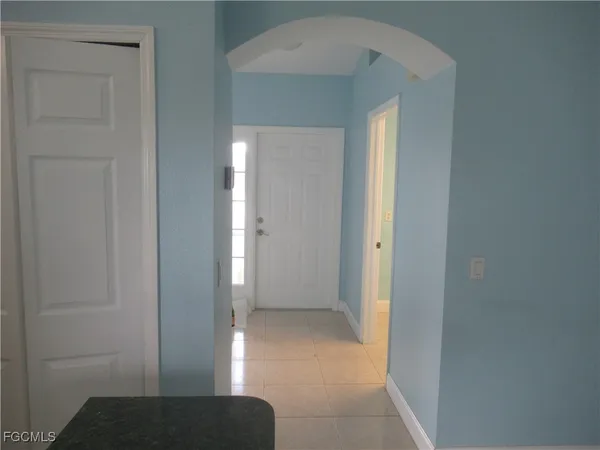 a view of hallway with a hallway and a closet