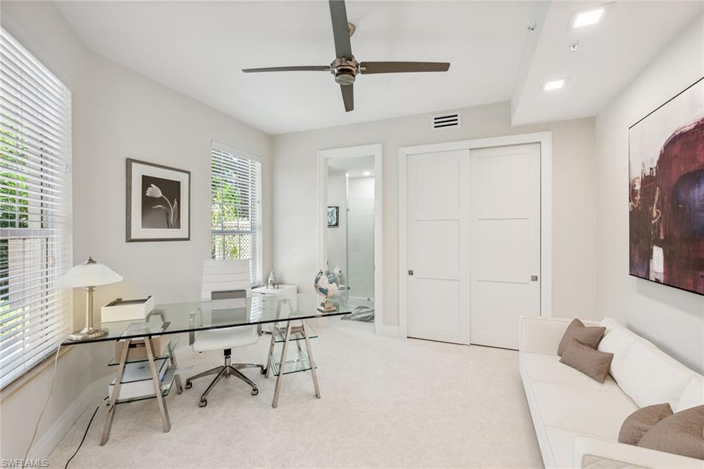 173 Colonade Circle, Unit 1401 Naples, FL 34103 - Photo 13 of 21 a workspace with furniture and window